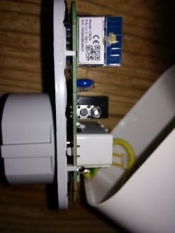Interior of an Electrical Socket Side view of the internal components of an electrical socket with visible electronic parts.