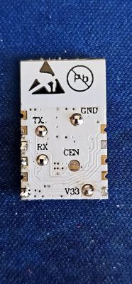 Electronic module with labels TX, RX, CEN, GND, and V33.