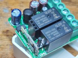 Interior of QS-WIFI-ECC02 Roller Shade Controller Interior of a roller shade controller with a PCB dated 2023.04.13.