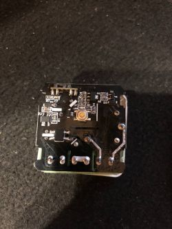 Electronic circuit with visible components on a circuit board.