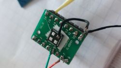 Electronic module with wires soldered to a green PCB
