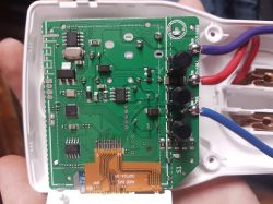 Interior of the ATORCH Smart Socket Energy Monitor Interior of the ATORCH Smart Socket energy monitor with visible electronic components.