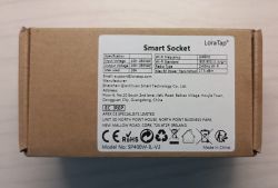 Specification Label on Smart Socket LoraTap Box Photo of the Smart Socket LoraTap box with a technical specification label.