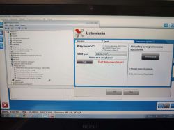 Ekran laptopa z Menedżerem urządzeń i oknem „Ustawienia” VCI z komunikatem „Test: Niepowodzenie!”