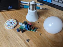 Disassembled Sylvania LED Bulb Disassembled LED bulb with visible internal components.