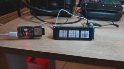 New OLED display connected to a circuit on a desk.
