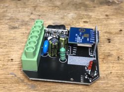 View of the interior of the PJ-MGW1103 device with electronic modules and components.