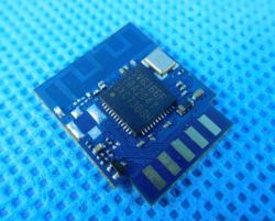 Blue Sonoff SV6166F electronic module with visible chip, traces, and antenna, placed on an anti-static mat.