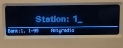 Radio display showing station selection.