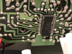 Close-up of PCB underside with IC marked “SEC A847 KA22425D” and soldered traces