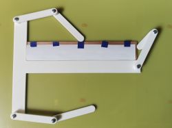 PCB positioning jig with printed paper sheet taped to copper-clad board