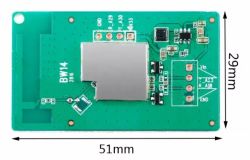 Small green printed circuit board with electronic markings.