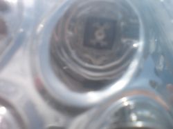 Opel corsa c 1.2 80km - Jak wymienić oświetlnie w tylnej lampie samochodu?