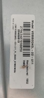 Label with barcodes on a metal surface, showing model VE6560QNDL-2D-U11