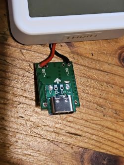 PCB with USB-C port connected by soldering to wires.
