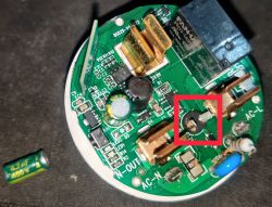 Damaged Capacitor on Electronic Circuit Board Electronic circuit board with a damaged capacitor.