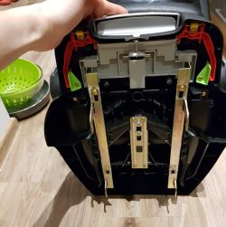 Dismantling Maxi Cosi Car Seat Base: Steps to Access Broken Wire Sensor