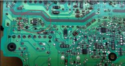 Close-up of a circuit board with a highlighted electronic component.