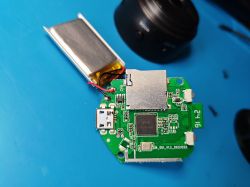 PCB of A9 Mini Camera Apparent PCB of A9 mini camera with a connected battery and USB port.