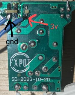 Green Printed Circuit Board with GND and 3V Markings View of the back of a green printed circuit board with GND and 3V markings.