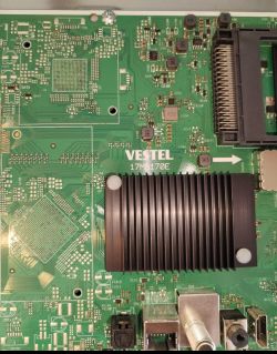 VESTEL 17MB170E mainboard with electronic components and black heatsink