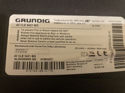 Label on Grundig 40 VLE 5421 BG TV showing technical data and safety warnings