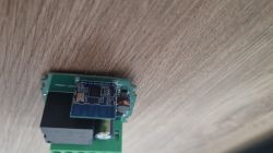 Electronic module with components on a wooden background