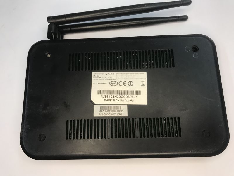 Analysis of the inside of the router, memory ripping, bootloader, custom program for UART
