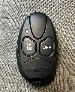 Pilot Webasto T91 z przyciskami grzania i wyłączania.