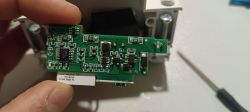 Close-up of a circuit board removed from a device.