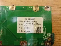 Płytka BMS ZP14S006-T-LC V1.2 z uszkodzeniami i korozją Uszkodzona płytka BMS ZP14S006-T-LC V1.2 z widocznymi oznaczeniami i śladami korozji