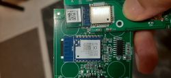 Electronic module with TUYA marking on a circuit board, visible components and connectors.