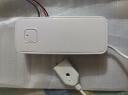 Battery-operated water leak sensor with a wired component.