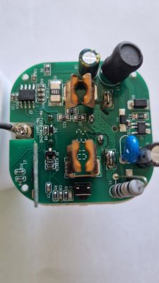 Interior of Elivco Tuya Circuit Board Electronic circuit board with components like capacitors and resistors.