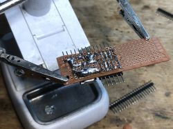 Prototyping Board with Soldered Components Soldered prototyping board with pins