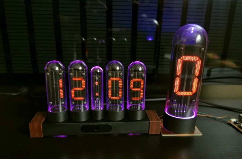 Digital tube clock with purple backlight and large standalone digit “0”