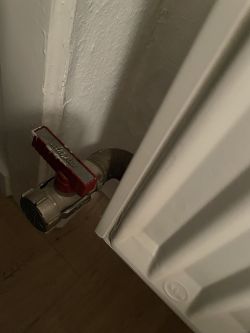 Valve on a radiator in an apartment.