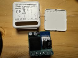 1CH Wi-Fi Switch Module with Open Casing 1CH Wi-Fi switch module with open casing and visible components.