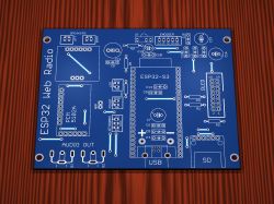 PCB render of ESP32‑S3 web radio with speaker, encoder, OLED, USB and SD card footprint