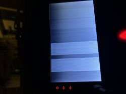 Car radio display with horizontal interference bands.