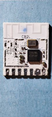 CB2L electronic module on fabric background.