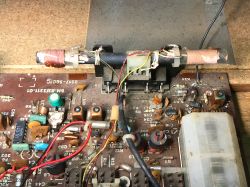 Interior of the Unitra Sudety R-208 Radio Receiver Close-up of the internal components of the Unitra Sudety R-208 radio receiver with a visible ferrite antenna.