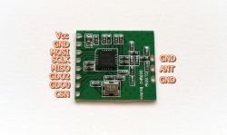 CC1101 868MHz Radio Module with Labeled Pins CC1101 868MHz radio module with labeled pins for connection, lying on a white surface.