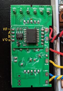 Circuit Board with Electronic Components and Labels Close-up of a circuit board with electronic components and labels.
