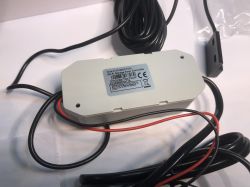 ATLO-GDC2-TUYA Garage Door Controller with Wiring ATLO-GDC2-TUYA garage door controller with cables and an information label.