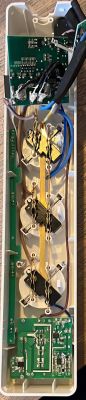 Interior of a modified LEDVANCE AC32646 power strip with visible circuits and wires.