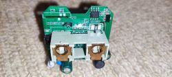 Interior of Device with PCB Internal view of a PCB with electronic components.
