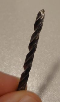 Drill Bit with Modified Tip Drill bit with a custom ground tip for unscrewing screws