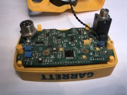 Interior of Garrett Ace 250 metal detector with visible PCB and components.