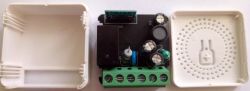 Open Smart Switch with Electronic Components Open smart switch box with visible electronic components.